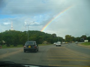 Nissan March under a rainbow near Nyangabwe Hill