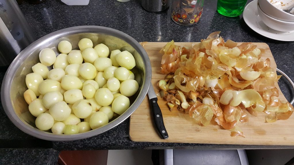 Naked onions ready for pickling.