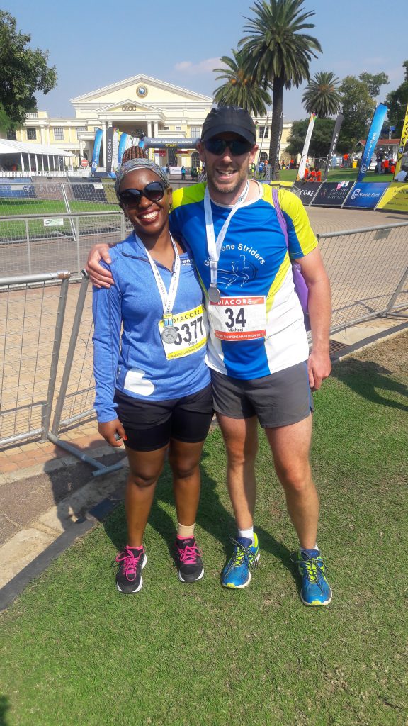 Happy couple after a marathon.